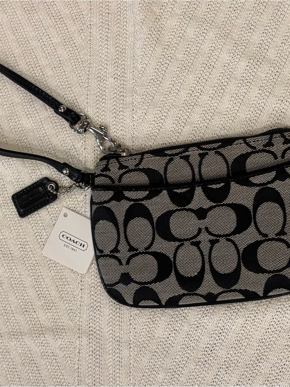 Coach classic Black & off white small Signature Canvas Wristlet